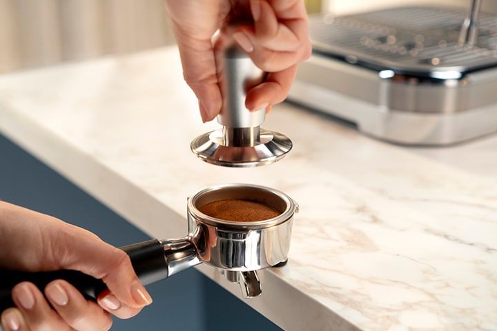 Prensado del café molido