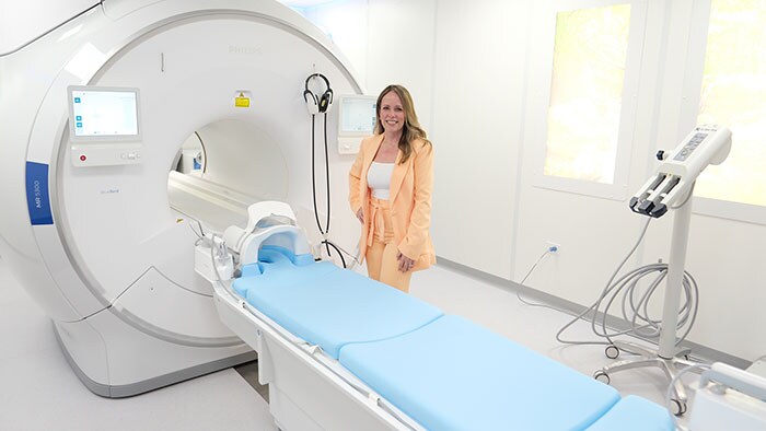 Dr. Mayra Maldonado, Owner/CEO, with the new MRI system installed at Vida Imaging & Breast Center